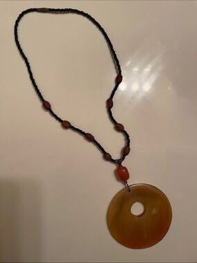 Stylish Women's Bead Necklace with Amber Donut Pendant